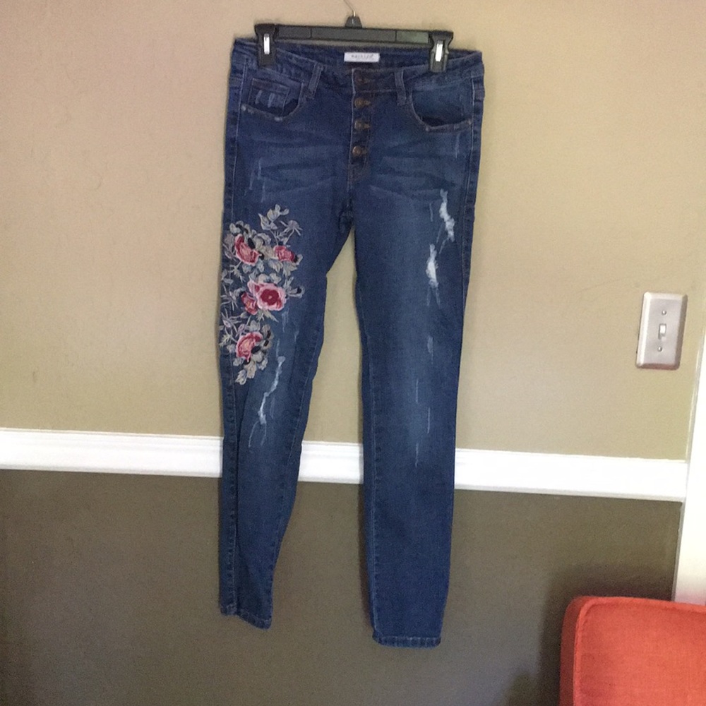 Button fly embroidered jeans